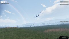 Helikopter treffen auf doppelten Regenbogen